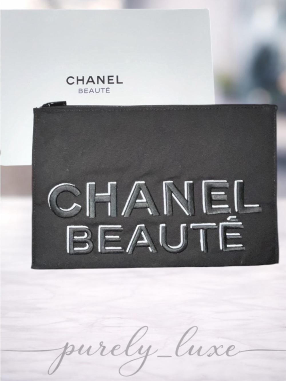 CHANEL BEAUTĒ Black Cosmetic Pouch with Raised Logo